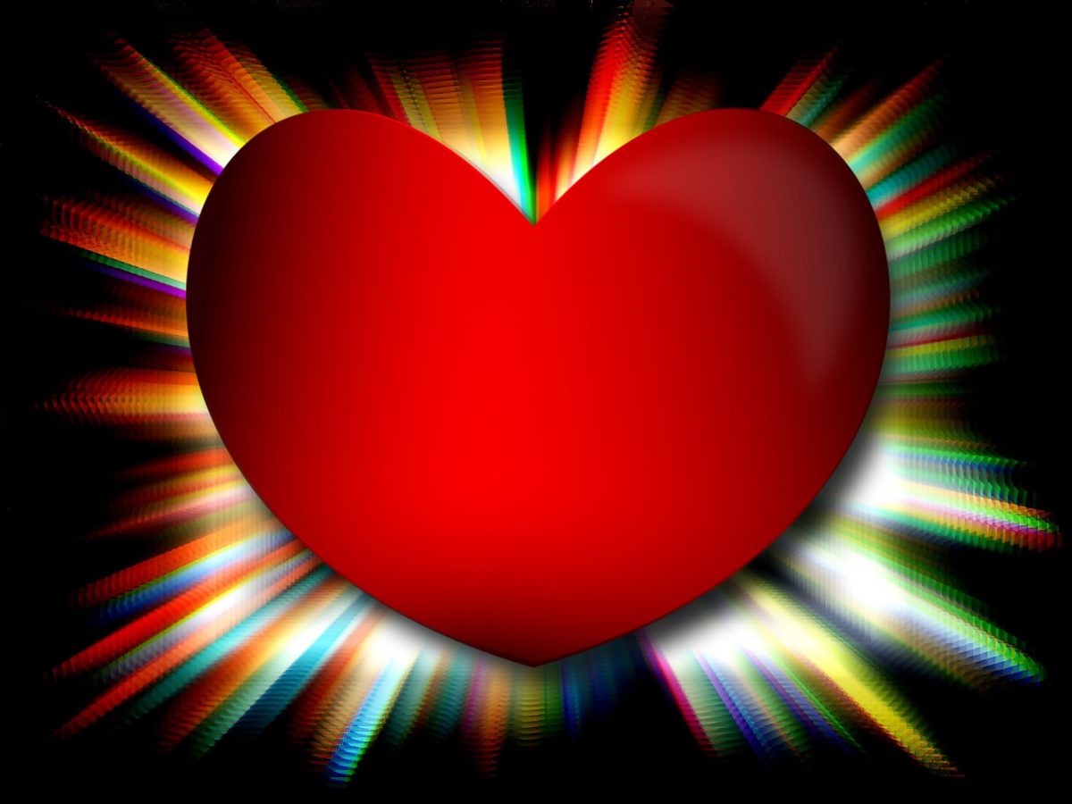big red heart with an explosion of light behind it like power of holy spirit