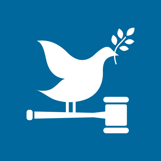 blue circle with a white dove sitting on a white judges gavel