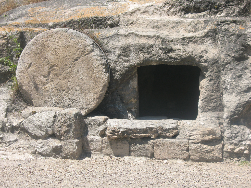 empty tomb with stone rolled away