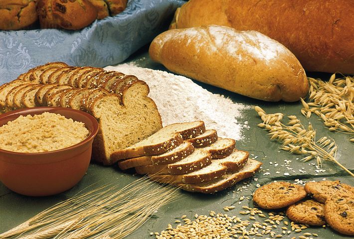 loaves of bread, some sliced