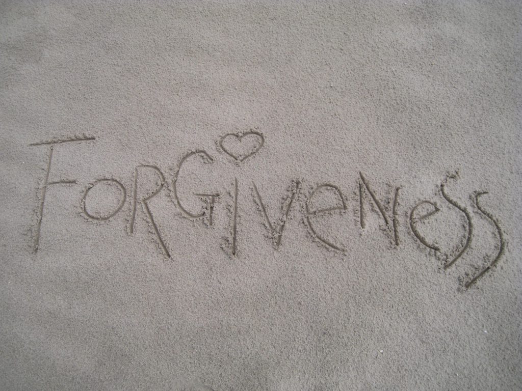 forgiveness written in the sand