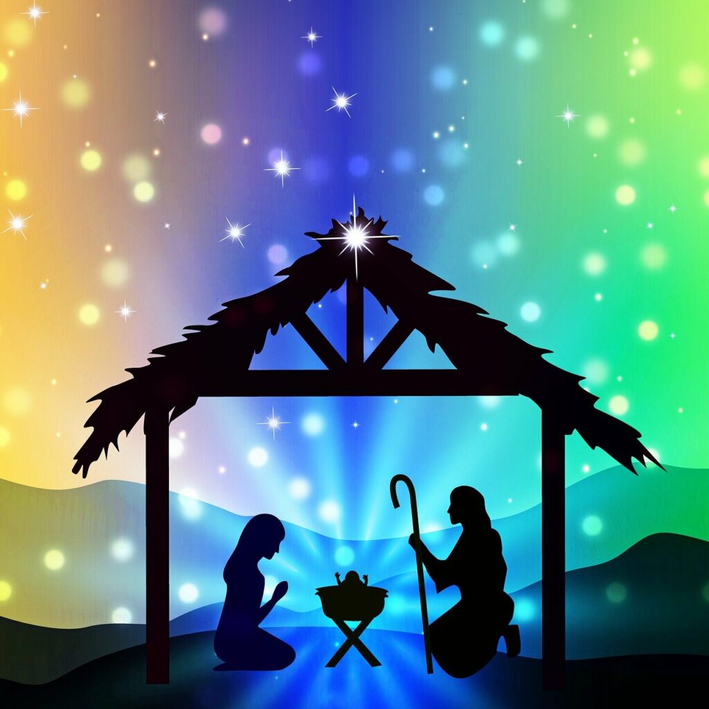 black outline of nativity against background of bright colorful lights