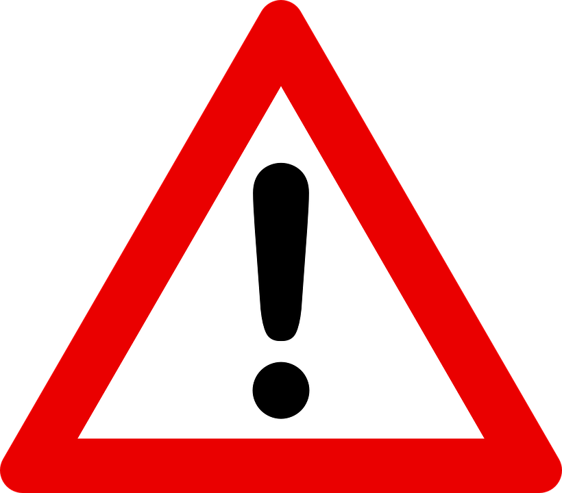 black exclamation point inside a red triangle to signify important information