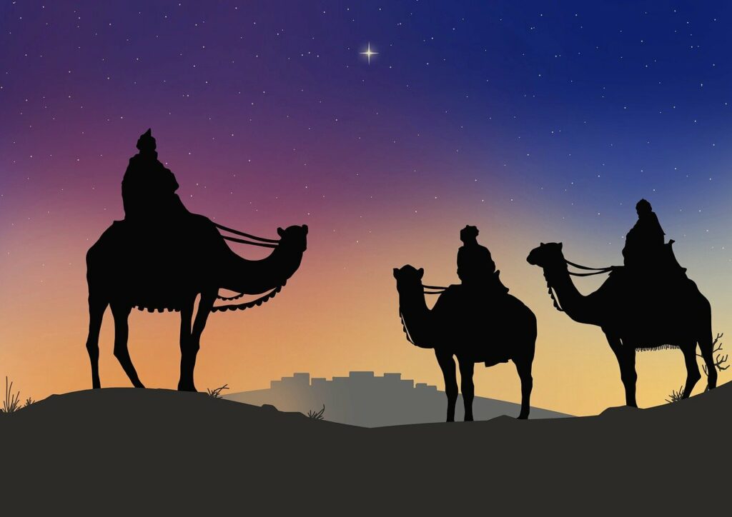 3 wise men silhouettes with a star in the sky