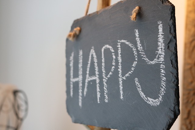 crafty chalkboard on the wall with the word HAPPY written in chalk