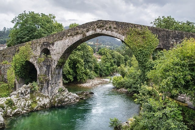 gate or bridge with water flowing under it