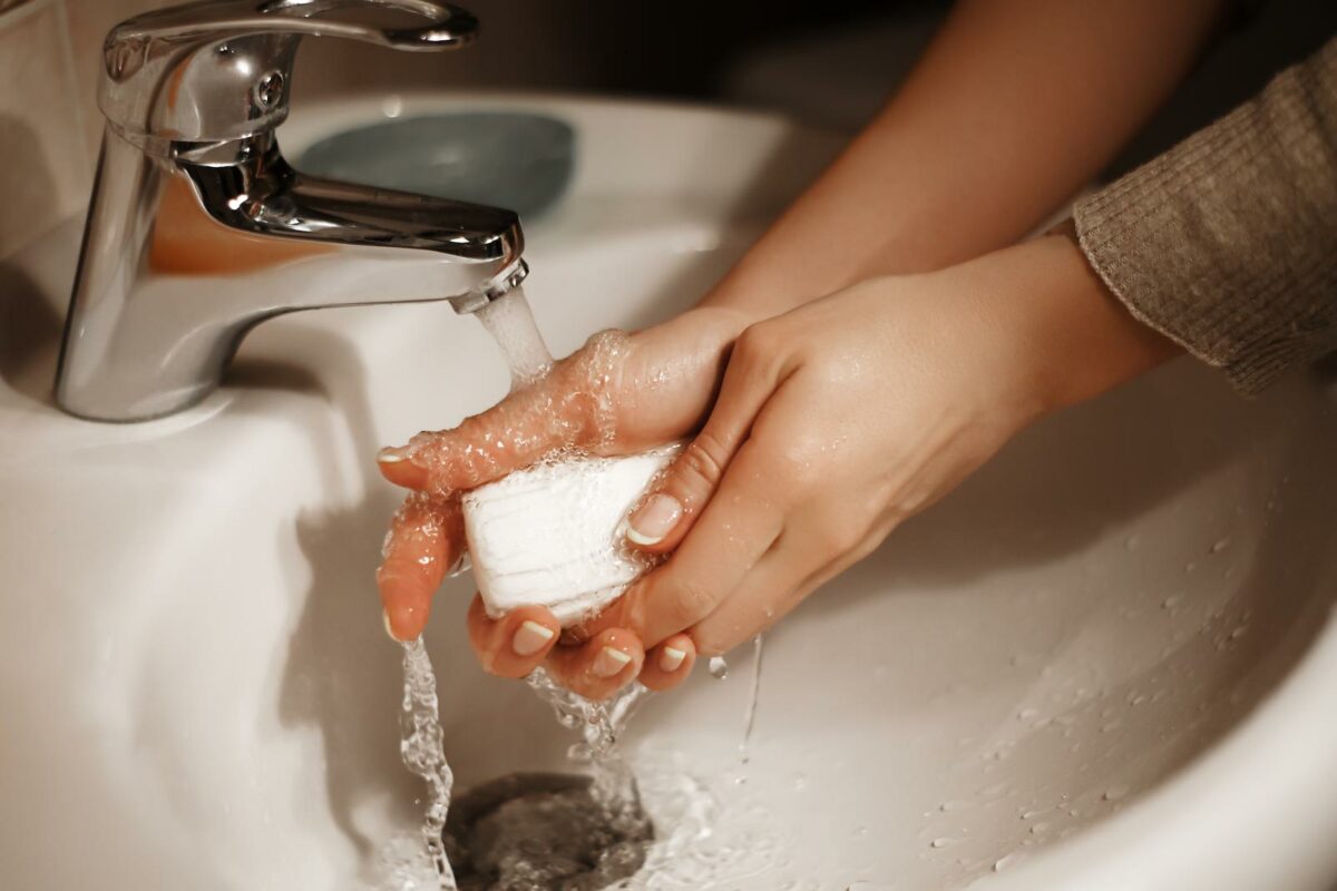 washing hands with soap and water