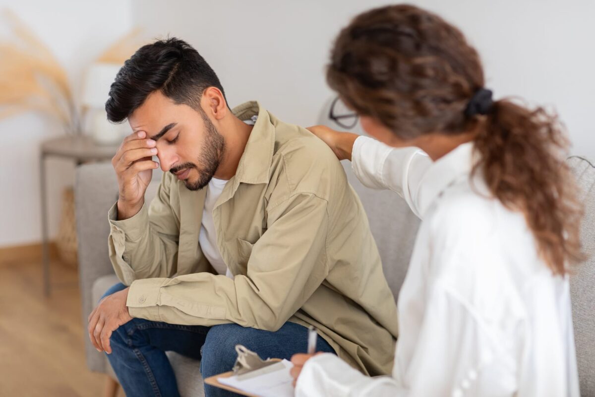 man receiving comfort for correction or consolation